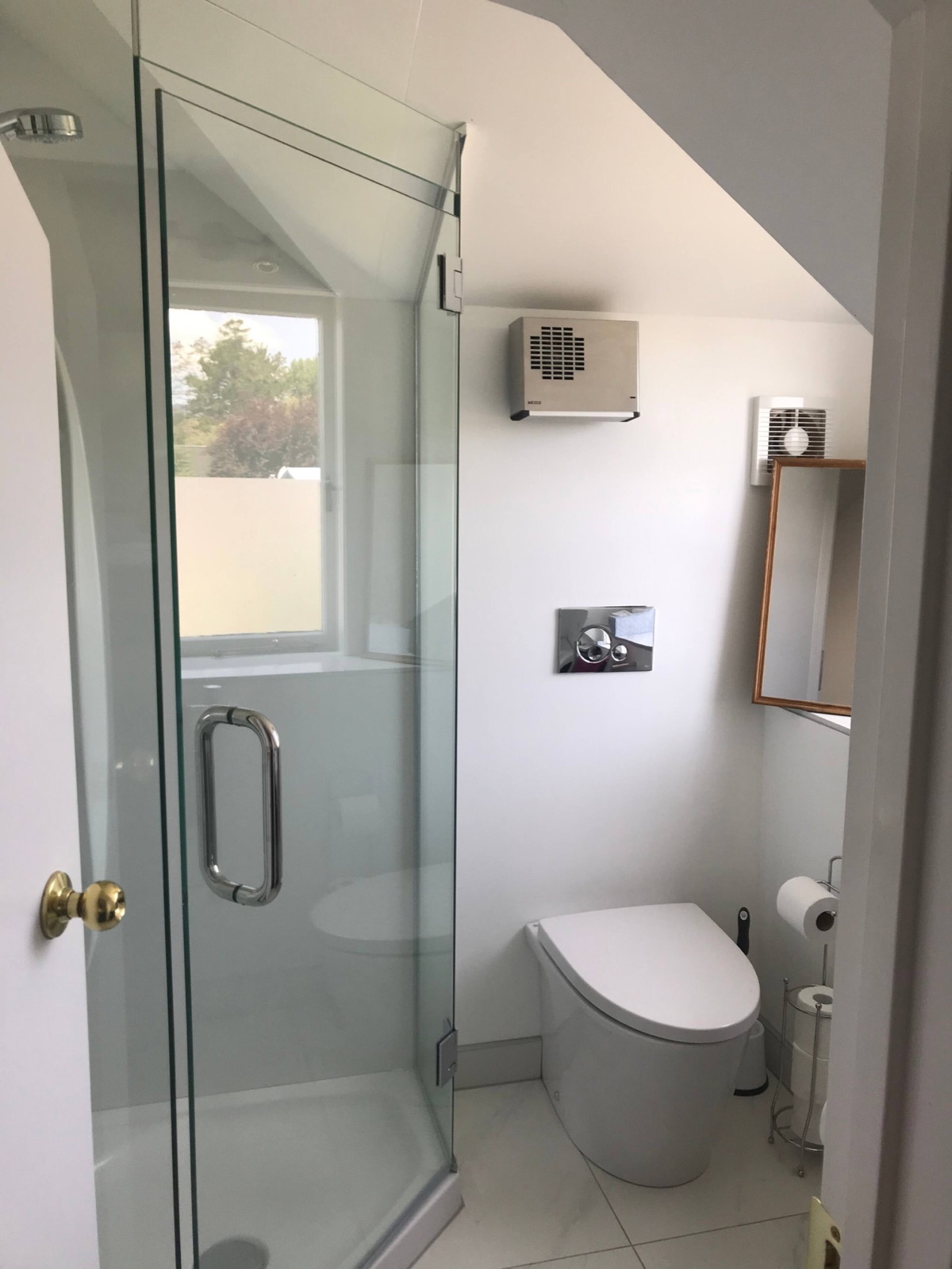 The private bathroom with glass shower