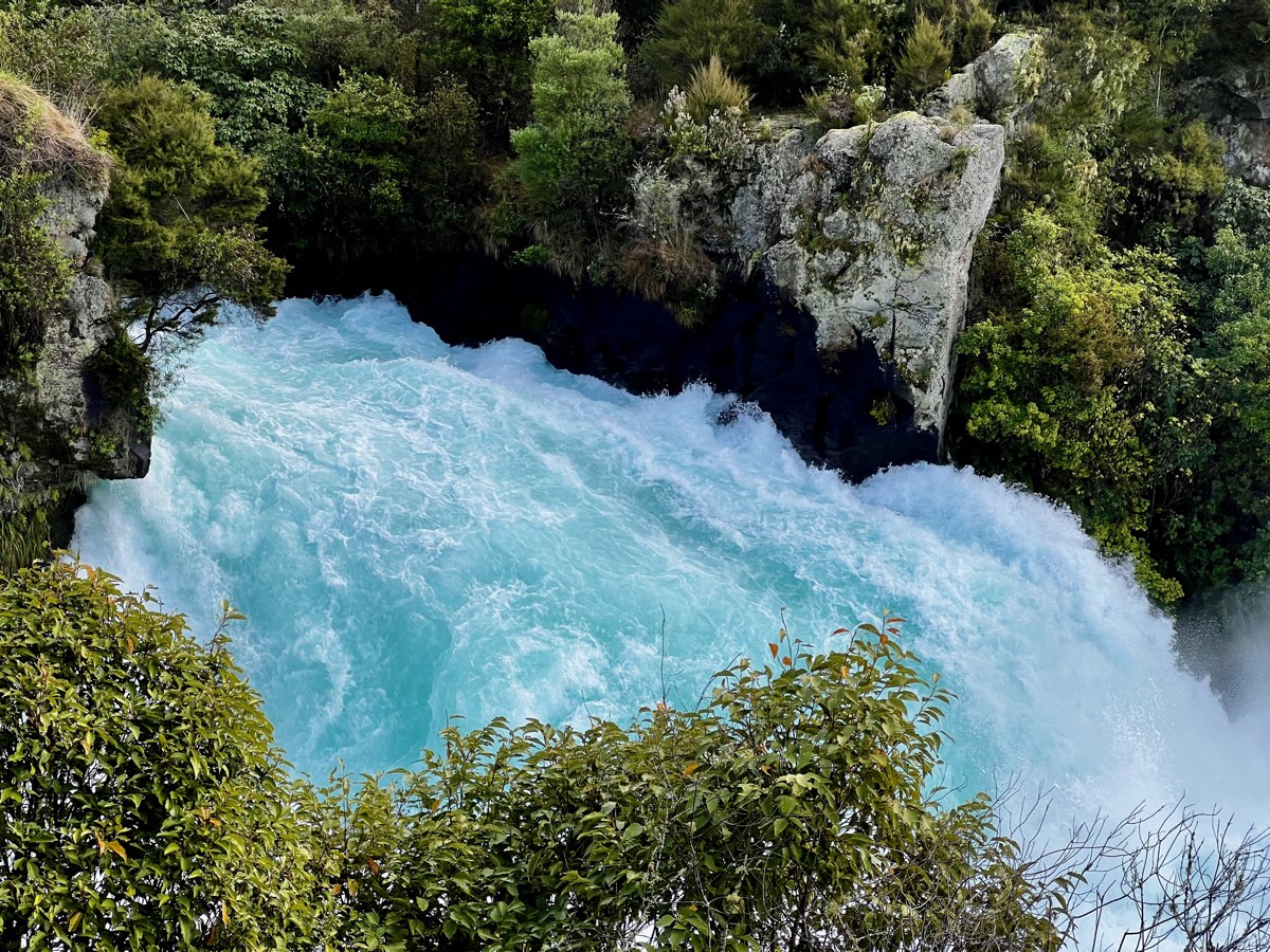 The full force of the falls entering the pool